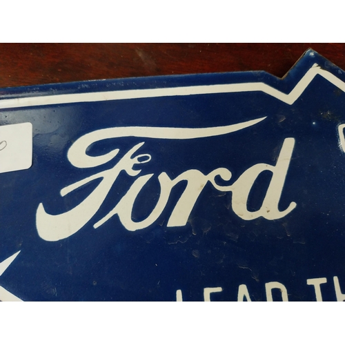 957 - Ford Lead the World in the Motor Business enamel sign. {16 cm H x 40 cm W}.