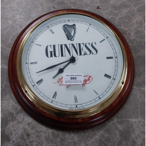 966 - Guinness advertising clock. {27 cm Dia}. PART OF THE DAVID HUGHES COLLECTION.