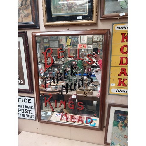 97 - Bells'  Kings Head Three Nuns' framed advertising mirror. {96 cm H x 72 cm W}.