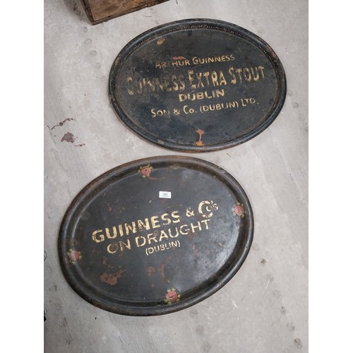 331 - Two early 20th C. tinplate drinks trays - Guinness and Co's on Draught Dublin and Arthur Guinness So... 