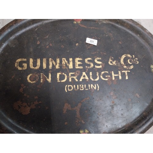 331 - Two early 20th C. tinplate drinks trays - Guinness and Co's on Draught Dublin and Arthur Guinness So... 