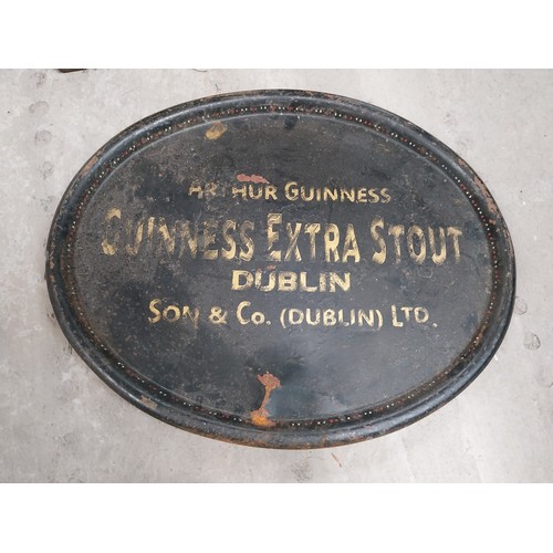 331 - Two early 20th C. tinplate drinks trays - Guinness and Co's on Draught Dublin and Arthur Guinness So... 