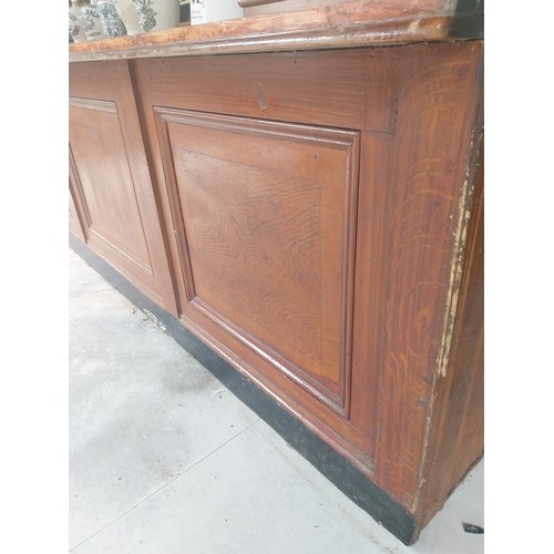 450A - Early 20th C. mahogany and pine bar counter with four inset panels {104 cm H x 410 cm W x 65 cm D}.