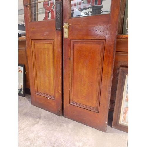 450C - Pair of mahogany doors with brass handles {209 cm H x 57 cm W each}.