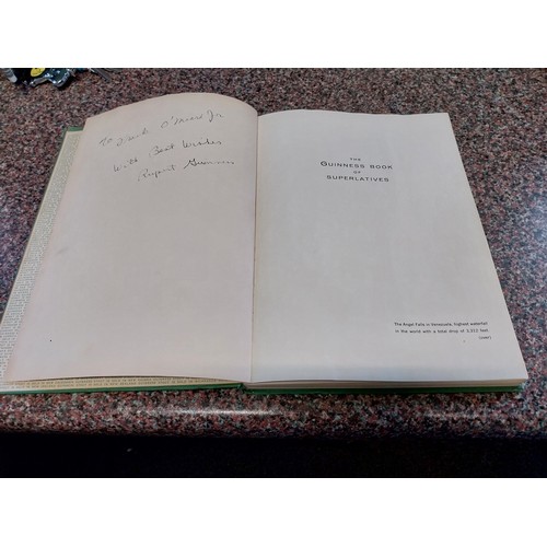 316 - The Guinness book of Superlatives, First edition hardback signed by Rupert Guinness, published in 19... 