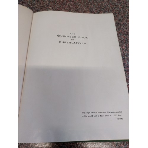 316 - The Guinness book of Superlatives, First edition hardback signed by Rupert Guinness, published in 19... 