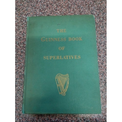 316 - The Guinness book of Superlatives, First edition hardback signed by Rupert Guinness, published in 19... 