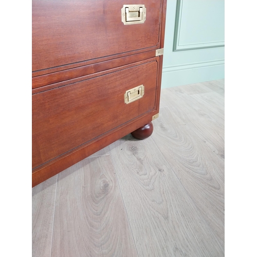 101 - Exceptional quality mahogany brass bound campaign style chest of drawers raised on bun feet {104 cm ... 