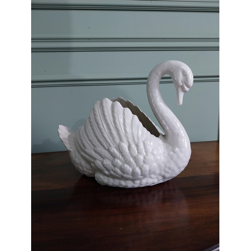 105 - Ceramic vase in the form of a Swan {29 cm H x 24 cm W x 21 cm D}.