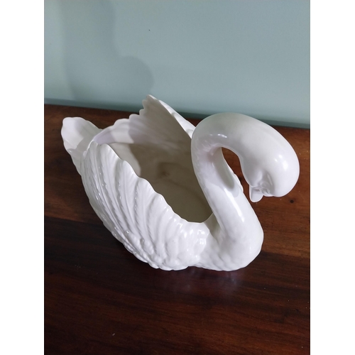 105 - Ceramic vase in the form of a Swan {29 cm H x 24 cm W x 21 cm D}.