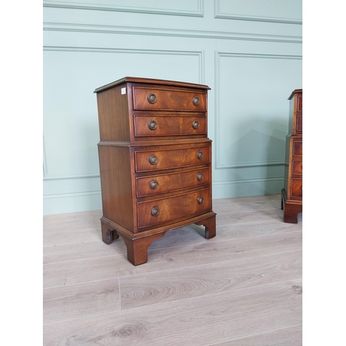 106 - Pair of good quality mahogany bedside lockers with five graduated drawers raised on bracket feet in ... 