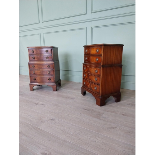 106 - Pair of good quality mahogany bedside lockers with five graduated drawers raised on bracket feet in ... 