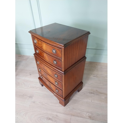 106 - Pair of good quality mahogany bedside lockers with five graduated drawers raised on bracket feet in ... 