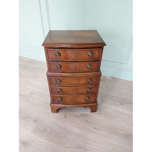 106 - Pair of good quality mahogany bedside lockers with five graduated drawers raised on bracket feet in ... 