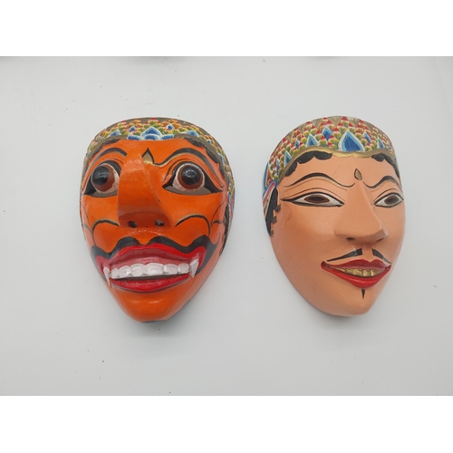 108 - Collection of six hand painted coconut tree wood tribal masks {Approx. 20 cm H x 16 cm W x 14 cm D}.