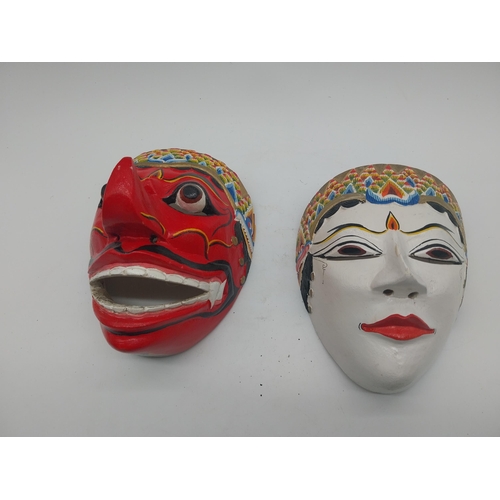 108 - Collection of six hand painted coconut tree wood tribal masks {Approx. 20 cm H x 16 cm W x 14 cm D}.