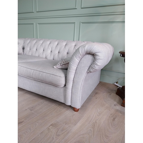 119 - Good quality buttoned upholstered Chesterfield sofa {72 cm H x 210 cm W x 106 cm D}.