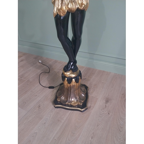 120 - Decorative gilded and ebonised wooden torchiere in the form of a boy {200 cm H x 40 cm W x 40 cm D}.... 