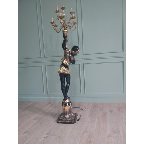 120 - Decorative gilded and ebonised wooden torchiere in the form of a boy {200 cm H x 40 cm W x 40 cm D}.... 