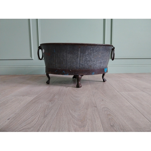 125 - Galvanised and metal log bucket with wrought iron handles raised on ball and claw feet {37 cm H x 74... 