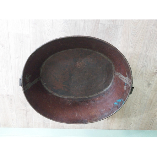 125 - Galvanised and metal log bucket with wrought iron handles raised on ball and claw feet {37 cm H x 74... 