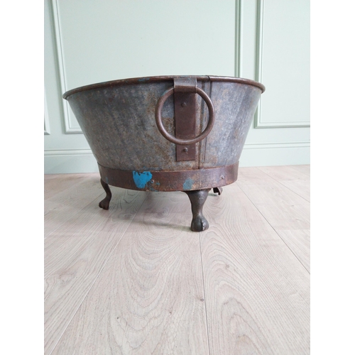 125 - Galvanised and metal log bucket with wrought iron handles raised on ball and claw feet {37 cm H x 74... 