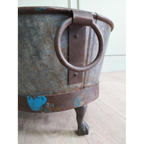 125 - Galvanised and metal log bucket with wrought iron handles raised on ball and claw feet {37 cm H x 74... 