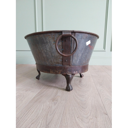 125 - Galvanised and metal log bucket with wrought iron handles raised on ball and claw feet {37 cm H x 74... 