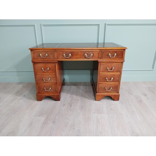 13 - Good quality mahogany pedestal desk with inset leather top raised on bracket feet in the Victorian s... 