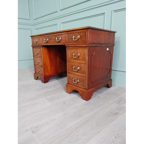 13 - Good quality mahogany pedestal desk with inset leather top raised on bracket feet in the Victorian s... 