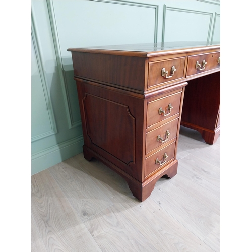 13 - Good quality mahogany pedestal desk with inset leather top raised on bracket feet in the Victorian s... 