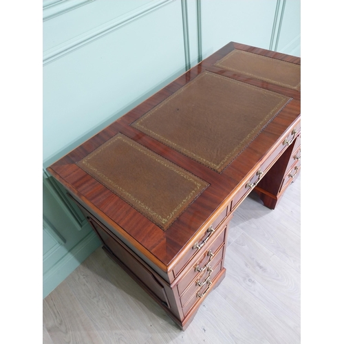 13 - Good quality mahogany pedestal desk with inset leather top raised on bracket feet in the Victorian s... 