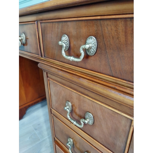 13 - Good quality mahogany pedestal desk with inset leather top raised on bracket feet in the Victorian s... 