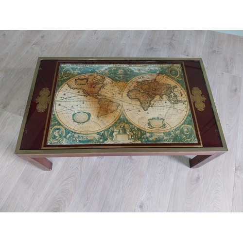 132 - Good quality mahogany and brass inlaid coffee table with world map insert raised on square legs and ... 