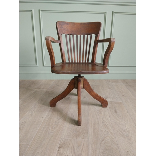 136 - 1940s oak desk chair {85 cm H x 54 cm W x 52 cm D}.