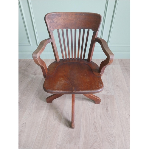 136 - 1940s oak desk chair {85 cm H x 54 cm W x 52 cm D}.