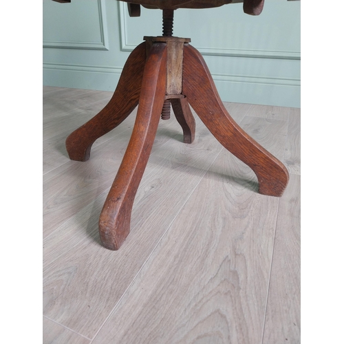 136 - 1940s oak desk chair {85 cm H x 54 cm W x 52 cm D}.