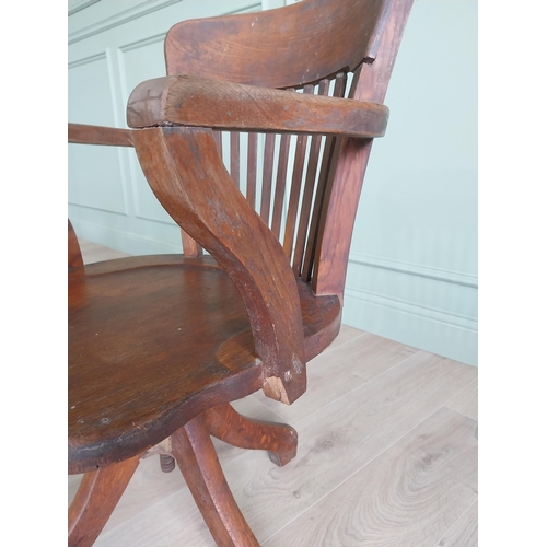 136 - 1940s oak desk chair {85 cm H x 54 cm W x 52 cm D}.