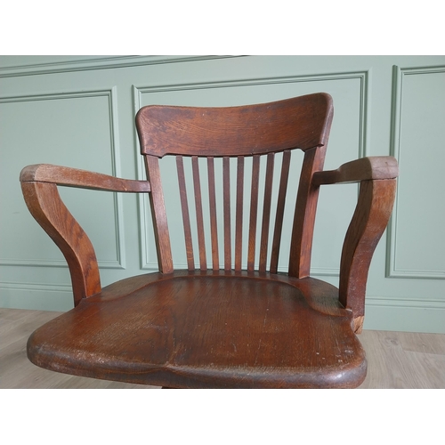 136 - 1940s oak desk chair {85 cm H x 54 cm W x 52 cm D}.