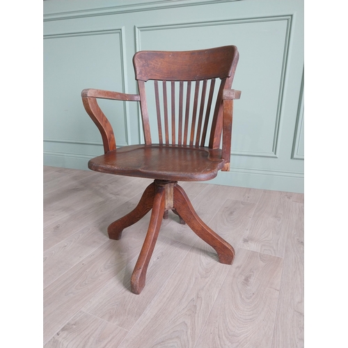 136 - 1940s oak desk chair {85 cm H x 54 cm W x 52 cm D}.