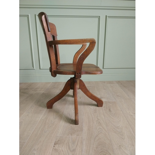 136 - 1940s oak desk chair {85 cm H x 54 cm W x 52 cm D}.