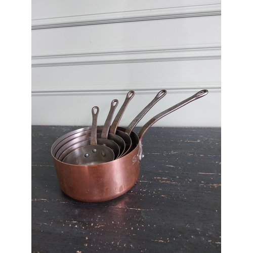 143 - Set of five French copper saucepans {20 cm H x 39 cm W x 20 cm D and 13 cm H x 22 cm W x 12 cm D}.