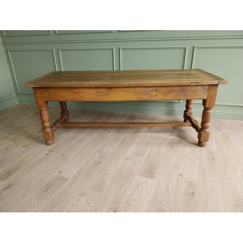 151 - Good quality oak kitchen table raised on turned legs and single stretcher {79 cm H x 210 cm W x 82 c... 