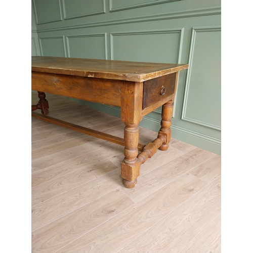 151 - Good quality oak kitchen table raised on turned legs and single stretcher {79 cm H x 210 cm W x 82 c... 