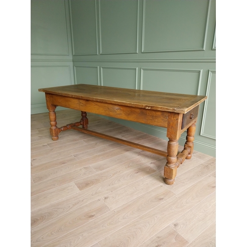 151 - Good quality oak kitchen table raised on turned legs and single stretcher {79 cm H x 210 cm W x 82 c... 