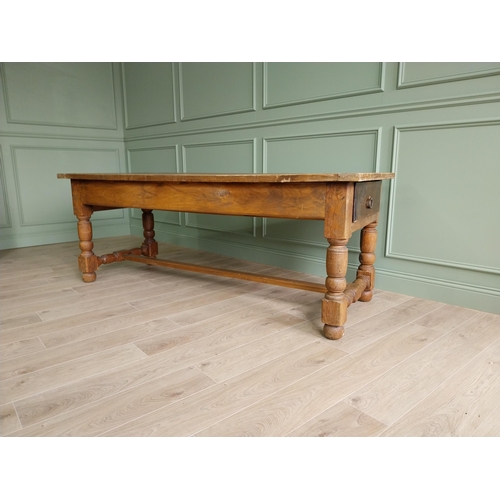 151 - Good quality oak kitchen table raised on turned legs and single stretcher {79 cm H x 210 cm W x 82 c... 