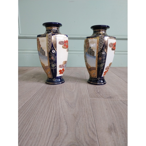 155 - Pair of early 20th C. Oriental hand painted and gilded vases {25 cm H x 13 cm Dia.}.