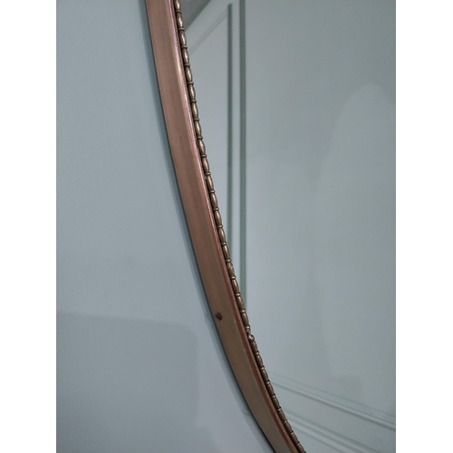 158 - Rare 1950s Italian bronze framed wall mirror in the Gio Ponti style {96 cm H x 60 cm W}.