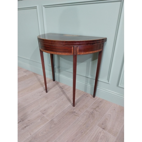 167 - Early 19th C. mahogany and satinwood inlaid turn over leaf demi-lune card table raised on square tap... 