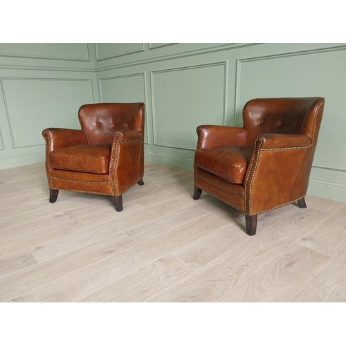 170 - Pair of exceptional quality French hand dyed leather tub chairs with brass studs raised on mahogany ... 